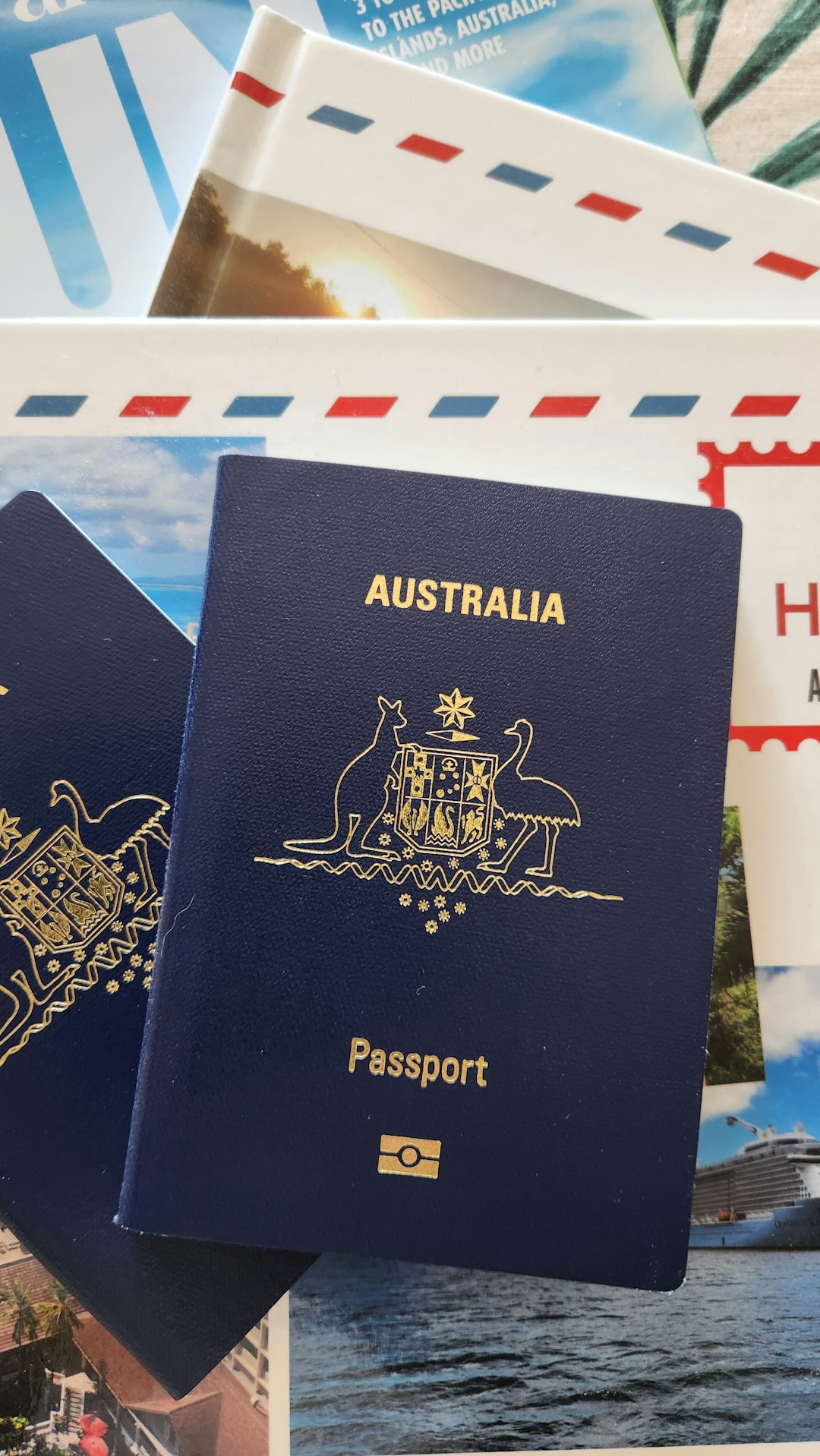 a-couple-of-blue-passports-sitting-on-top-of-each-other-iayx9pvwyak.jpeg