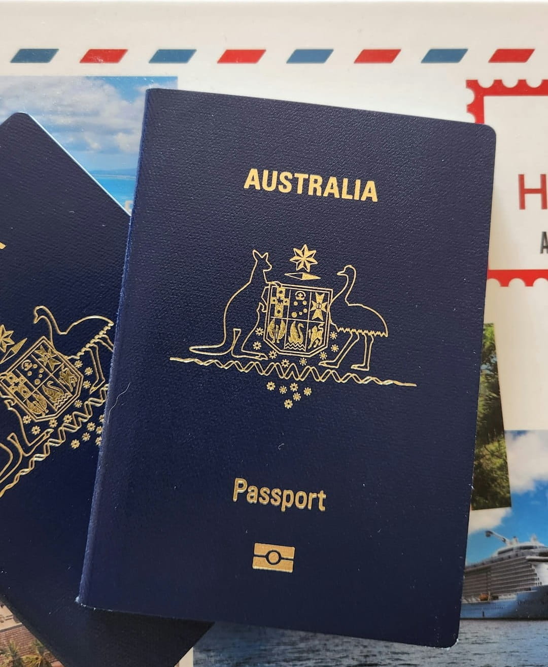 a-couple-of-blue-passports-sitting-on-top-of-each-other-iayx9pvwyak (1)